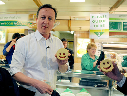 Election campaign: David Cameron meets shoppers in Bury market, Greater Manchester
