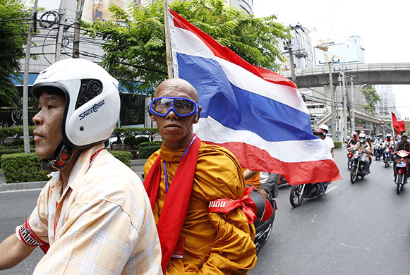 Thailand protests: Buddhist monk joins Red Shirt convoy in Bangkok