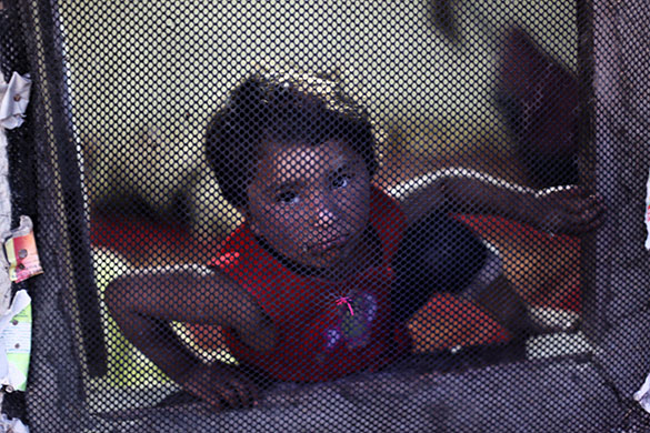 24 hours in pictures: Kabul, Afghanistan: Marziya, an internally displaced girl