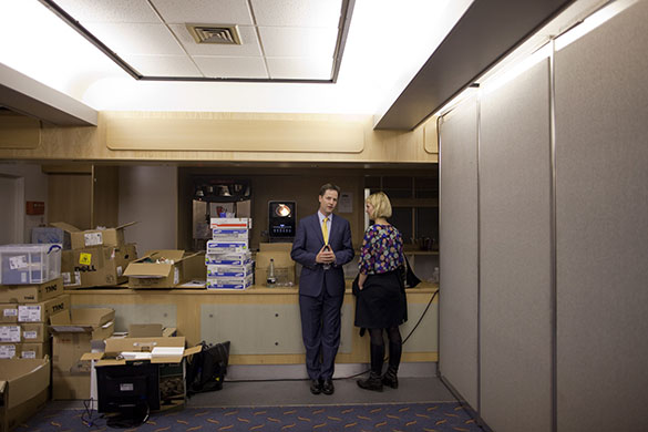 Campaigning with Clegg: Liberal Democrat leader Nick Clegg talks to his spin doctor