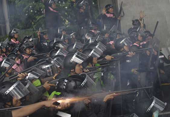 24 hours in pictures: Riot police open fire on soldiers  mistaken for Red Shirts in Bangkok