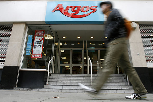 Week in Business: A pedestrian passes a branch of Argos in central London