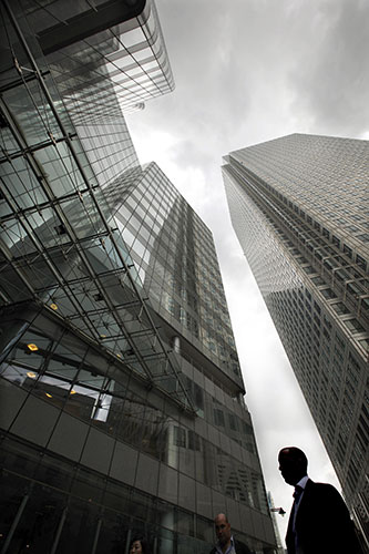 Week in Business: A pedestrian walks past the headquarters of the Financial Se