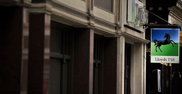Week in Business: A sign hangs from the front of a Lloyds Bank in central London