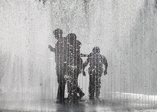 In Pictures: monochrome: people playing in a fountain