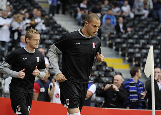 Fulham v Hamburg: Having been passed fit, Bobby Zamora comes out to warm up