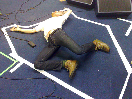 Show and Tell: Hot Chip: Hot Chip's Al lies on the floor during rehearsal