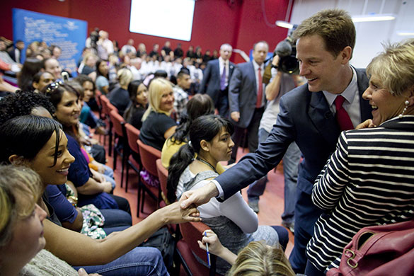 Campaigning with Clegg: Nick Clegg shakes the hand of Maya Black at South Birmingham College