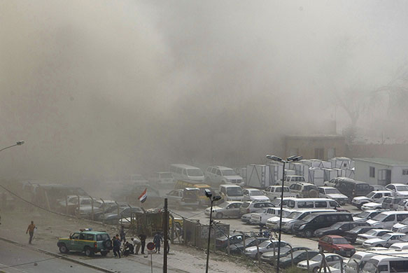 Baghdad explosions: Smoke billows from the scene of a massive explosion in Baghdad