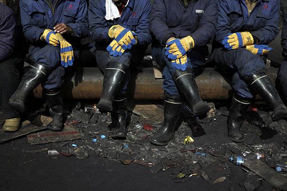 24 hours in pictures: Shanxi province, China: Rescue workers on standby 