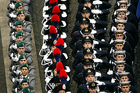 24 hours in pictures: Vatican: Members of the Italian Armed Forces stand in St Peter's Square