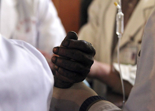 Miners rescued in China: Rescued miner from the flooded Wangjialing Coal Mine in China