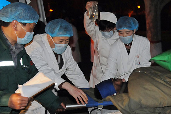 Miners rescued in China: A survivor of the Wangjialing Coal Mine accident in China