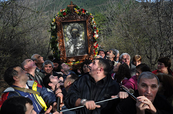 24 hours in pictures: Bulgarian Orthodox pilgrims carry an icon of the Virgin Mary