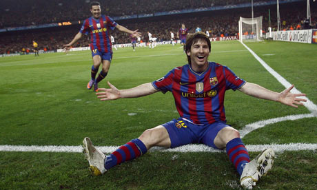 Lionel Messi of Barcelona celebrates after scoring against Arsenal