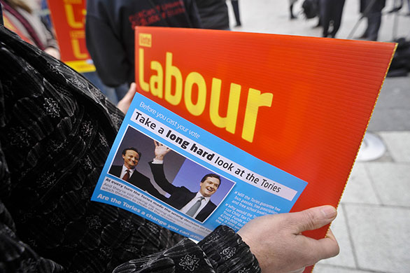Election campaign: Labour supporters hold Labour placards and anti-Tory leaflets in Cardiff 