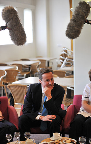 Election campaign: Conservative Party leader David Cameron speaks to nurses