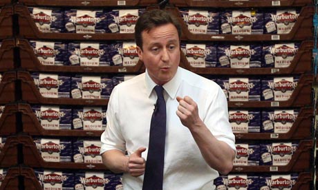 David Cameron talks to workers at the Warburton's bread factory in Bolton on 7 April 2010.