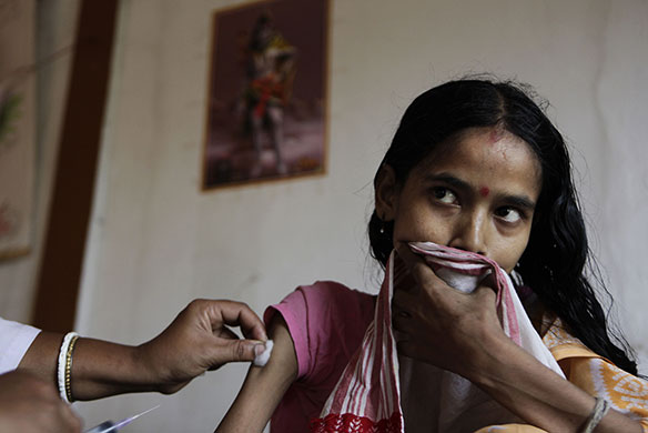 24hours: A nurse administers a shot at the state TB hospital in Gauhati, India
