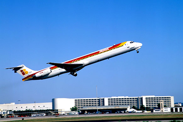 British Airways merger: 2002: An Iberia Mcdonnell Douglas MD88 plane takes off from Palma airport