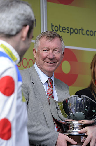 Grand National day one: Fergie with the Totesport Bowl