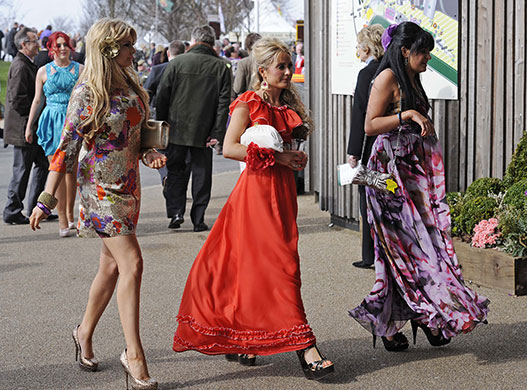Grand National day one: Posh frocks and high heels were the order of the day for the ladies