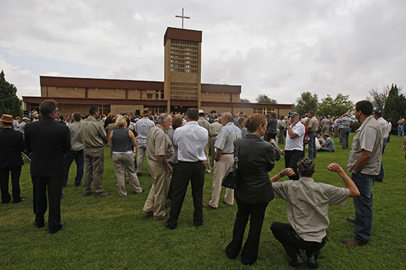 TerreBlanche: Supporters of Eugene Terre'Blanche stand outside the church