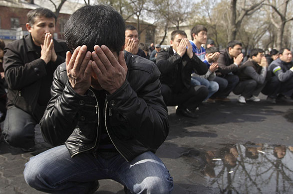 24 hours in pictures: Bishkek, Kyrgyzstan: People gather to mourn poeple killed by police