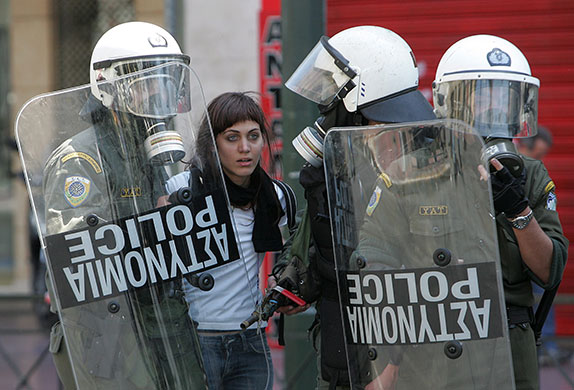Athens Riot: Protesters clash with riot police during a demonstration in Athens on 1 May