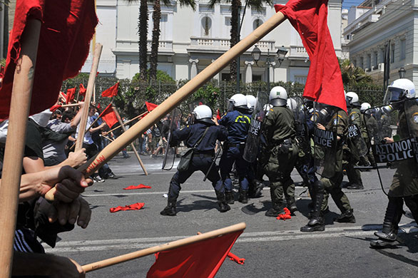 Athens Riot: Protestors clash with police by the Greek parliament