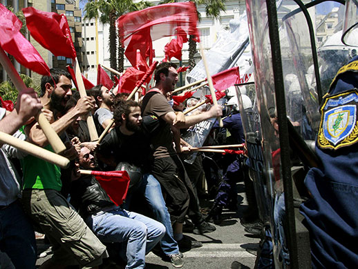 Athens Riot: Protesters clash with policemen during riots at a May Day rally in Athens