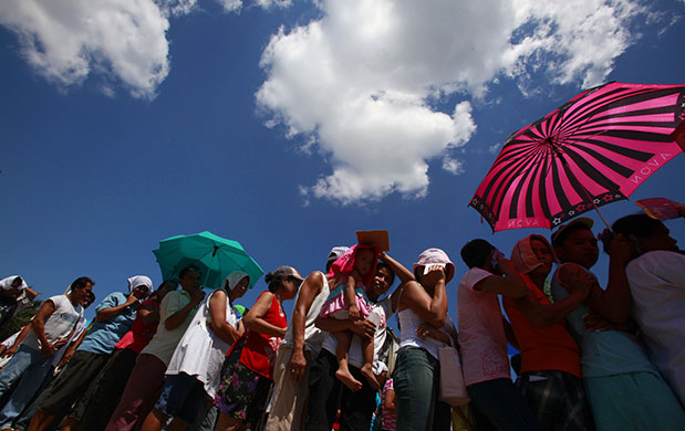 Philippine elections: People line up to vote in a public school in Las Pinas