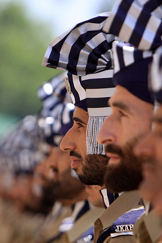 24 hours in pictures: ndian policemen at a guard of honour ceremony, Srinagar, India
