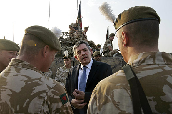 Gordon Brown: Gordon Brown talks with British troops at their base in Basra
