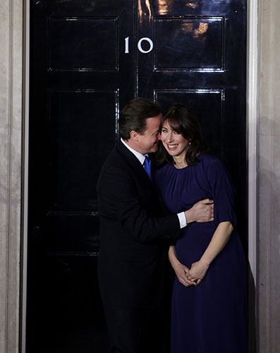 Cameron's big day: David and Samantha Cameron outside the door to No 10