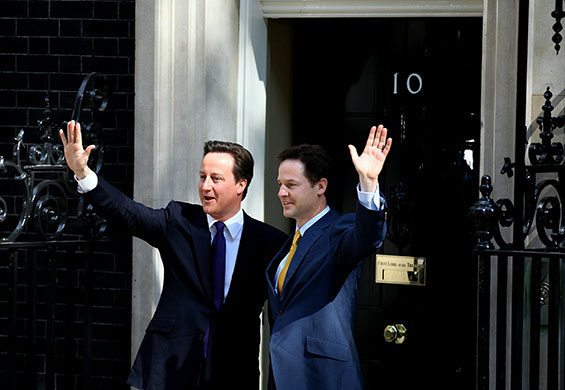 Conservatives arrive: David Cameron welcomes Deputy Prime Minister Nick Clegg to Downing Street 