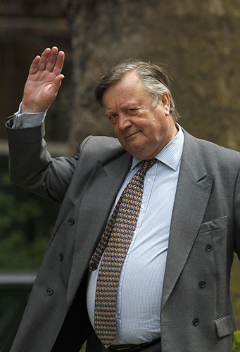 Conservatives arrive: Conservative Party MP Ken Clarke waves as he arrives at 10 Downing Street 