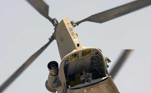 24 hours in pictures: Chinook helicopter gunman provides security in Kandahar