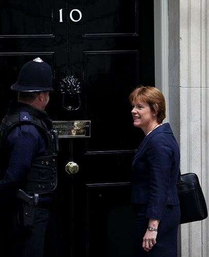 Conservatives arrive: Caroline Spelman at the door of Number 10