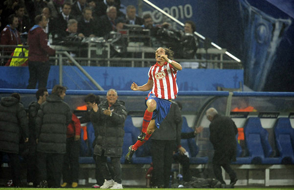 Europa League: Diego Forlan celebrates opening the scoring for Atletico Madrid 