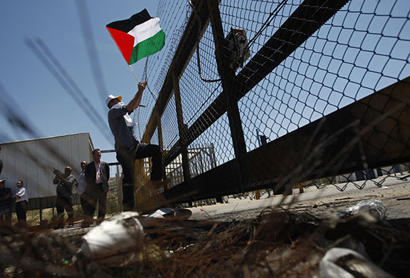 24 hours in pictures: Ramallah, West Bank: A Palestinian during a protest outside Ofer prison