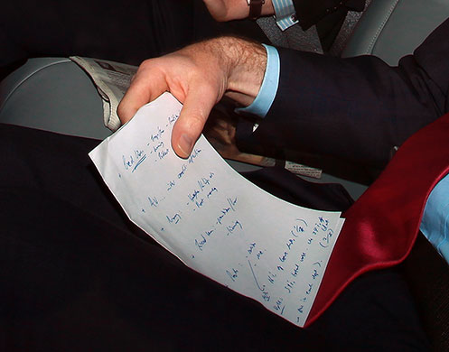 The Guardian's election : Nick Clegg speaks on the phone as he leaves the Commons