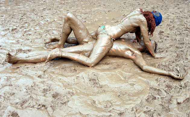Glastonbury at 40: Glastonbury Festival Festivalgoers in the mud