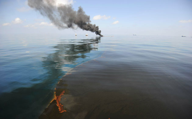 Deepwater Horizon: Gulf Oil Spill Begins To Reach Land : Oil burns during a controlled fire