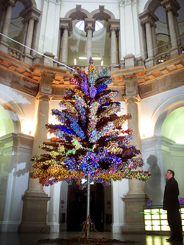 Yinka Shonibare: A JOURNALIST VIEWS A CHRISTMAS TREE AT THE TATE BRITAIN IN LONDON.