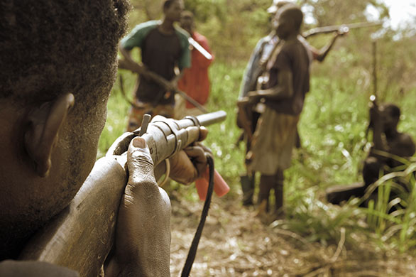 Obo Dispatch: Self-defence militiamen checking the identity of a civilian in the bush