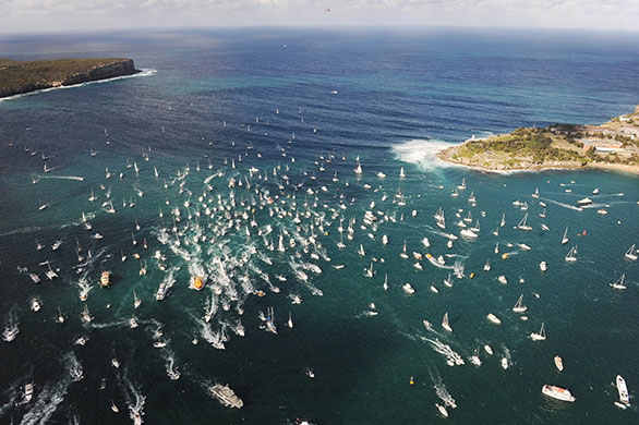 24 Hours in Pics: A large flotilla welcomes sailor Jessica Watson as she sails into Sydney
