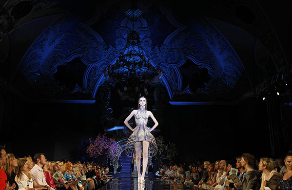 24 Hours in Pics: A model presents a creation by French designer Jean-Paul Gaultier in Moscow