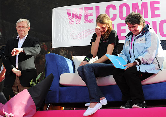 Jessica Watson and her mother, Julie, on stage with the prime minister, Kevin Rudd