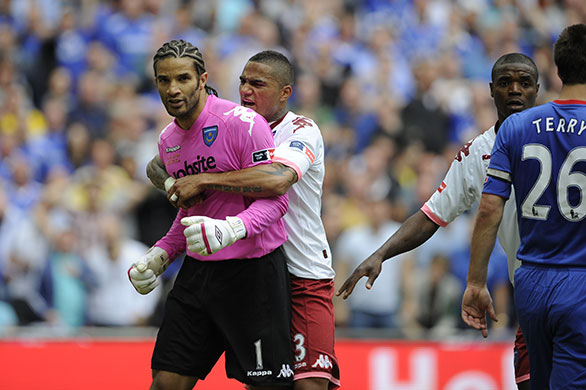 FA Cup Final: Kevin-Prince Boateng clutches David James after he saved a 